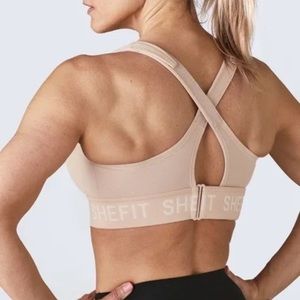 Shefit size medium WHITE high impact adjustable sports bra.